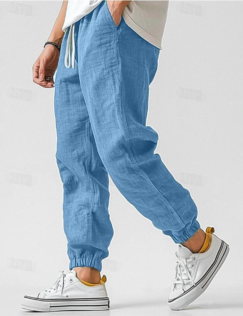 Men's textured jogger trousers with drawstring waist and elastic cuffs