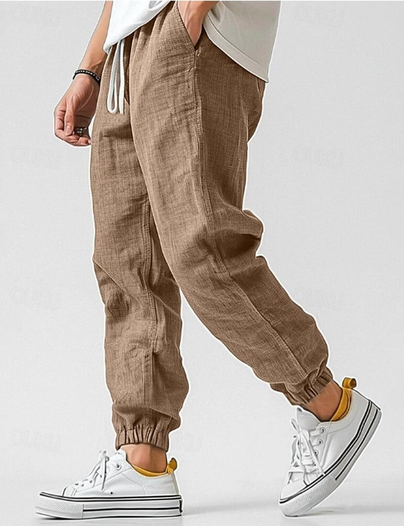 Men's textured jogger trousers with drawstring waist and elastic cuffs