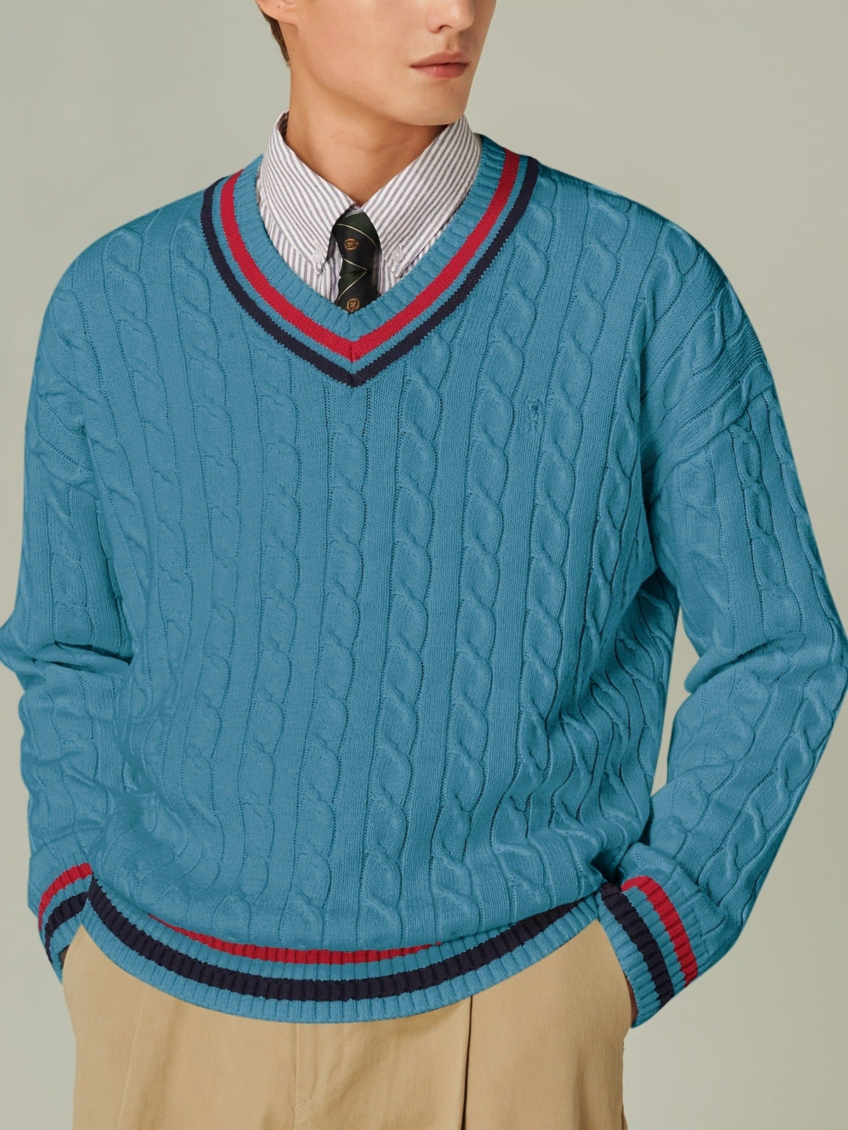 Men's cable knit V-neck sweater with striped trim