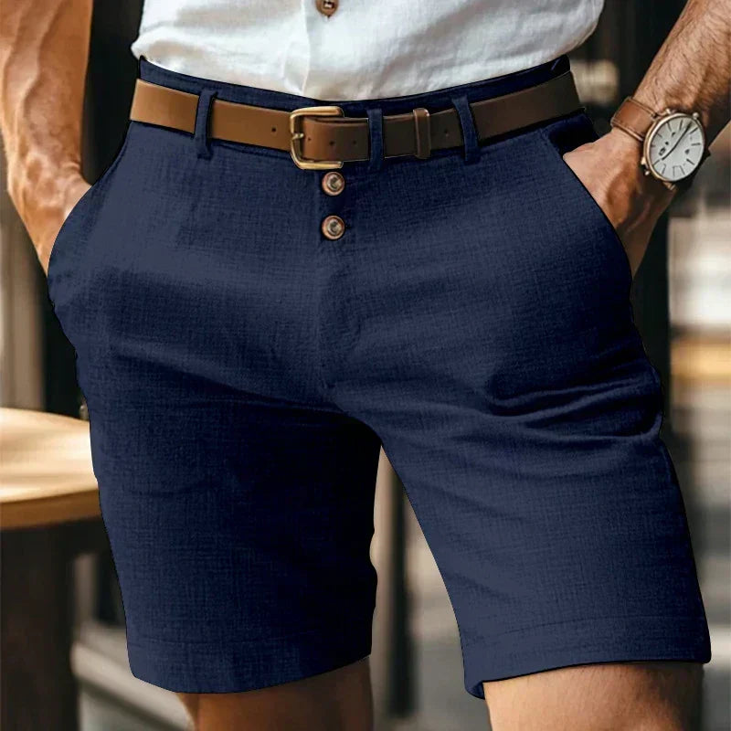 Men's mid-length chino shorts with button front and belt loops