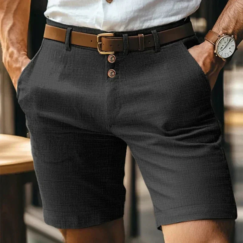 Men's mid-length chino shorts with button front and belt loops
