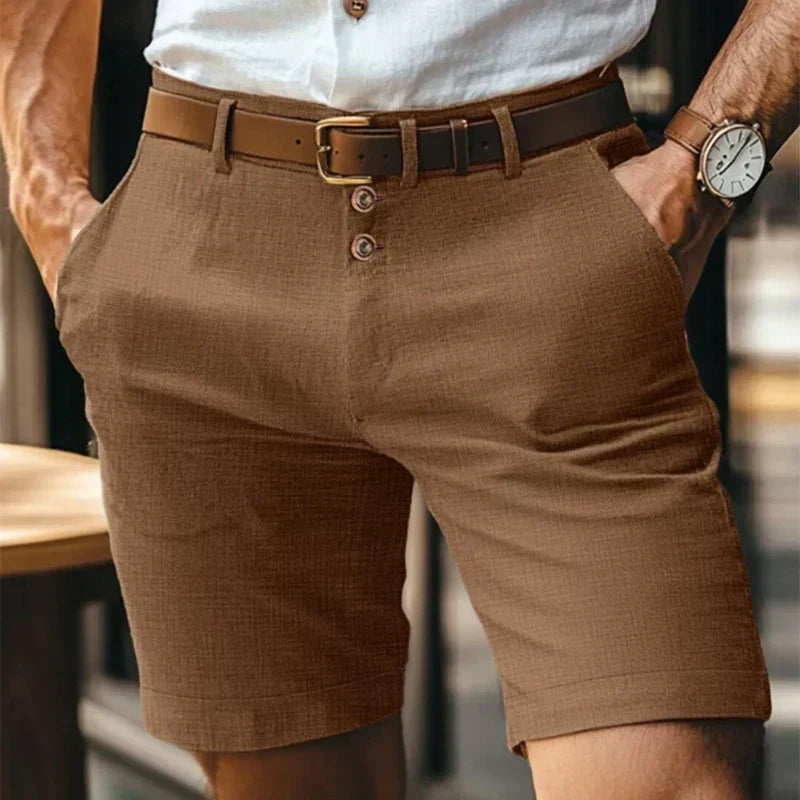 Men's mid-length chino shorts with button front and belt loops