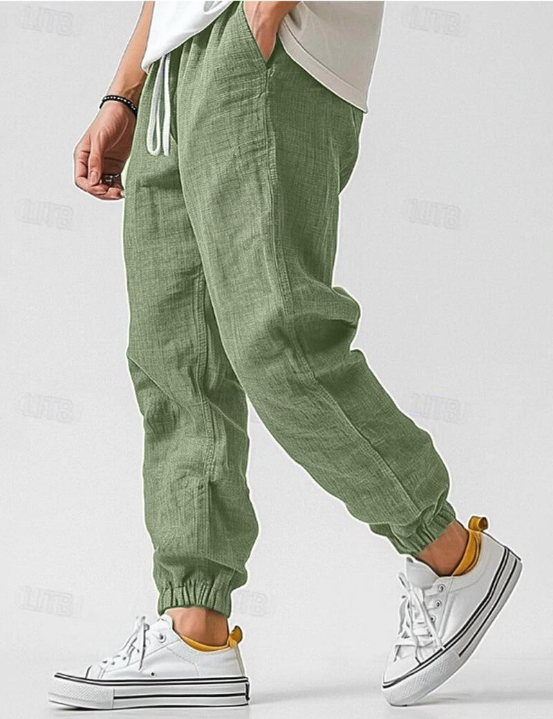 Men's textured jogger trousers with drawstring waist and elastic cuffs