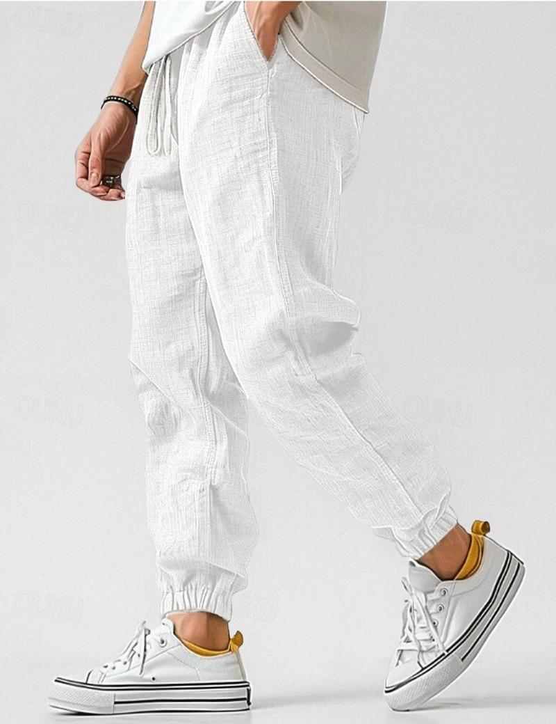 Men's textured jogger trousers with drawstring waist and elastic cuffs