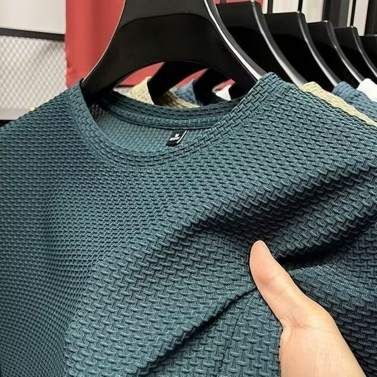 Men's textured knit crew neck T-shirt on a hanger