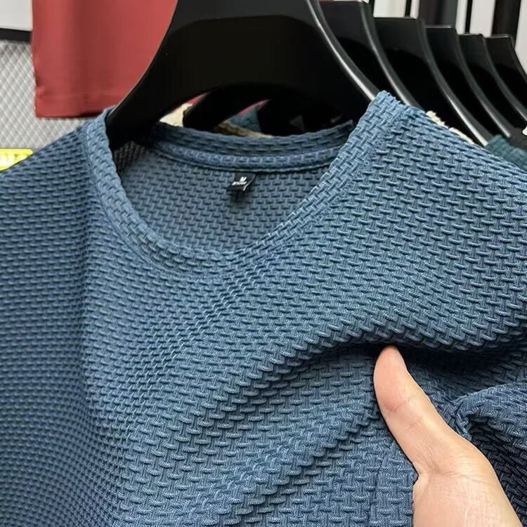 Men's textured knit crew neck T-shirt on a hanger