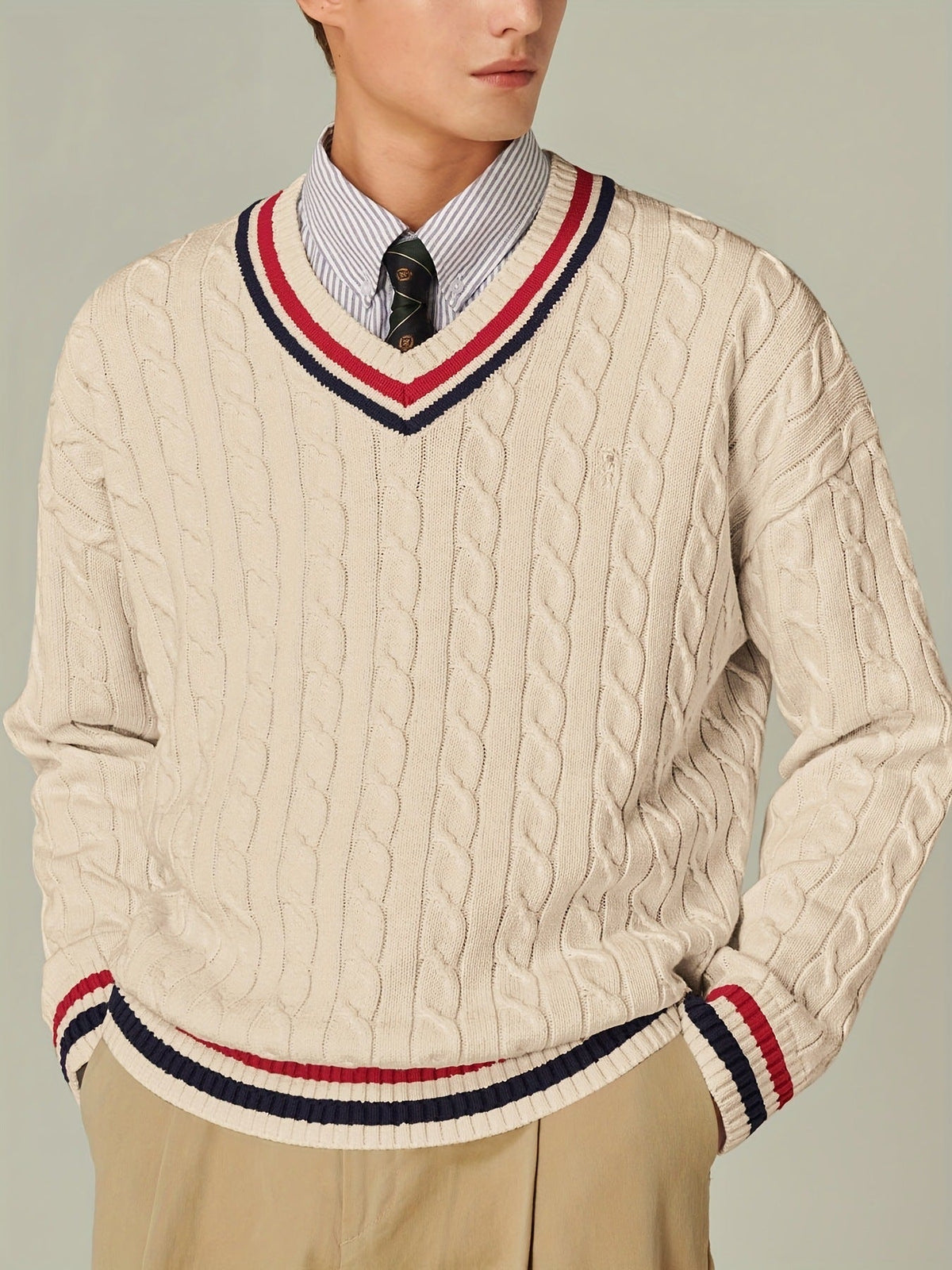 Men's cable knit V-neck sweater with striped trim