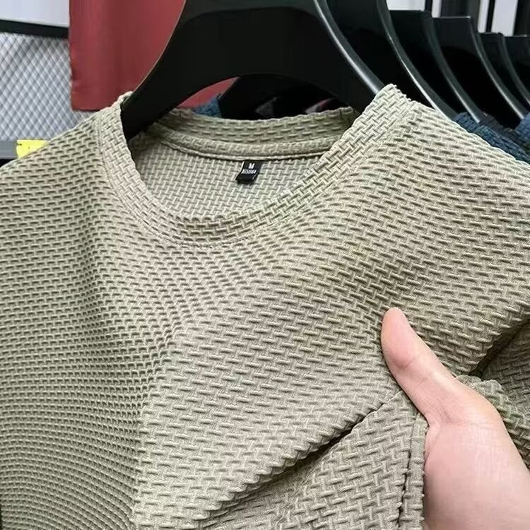 Men's textured knit crew neck T-shirt on a hanger