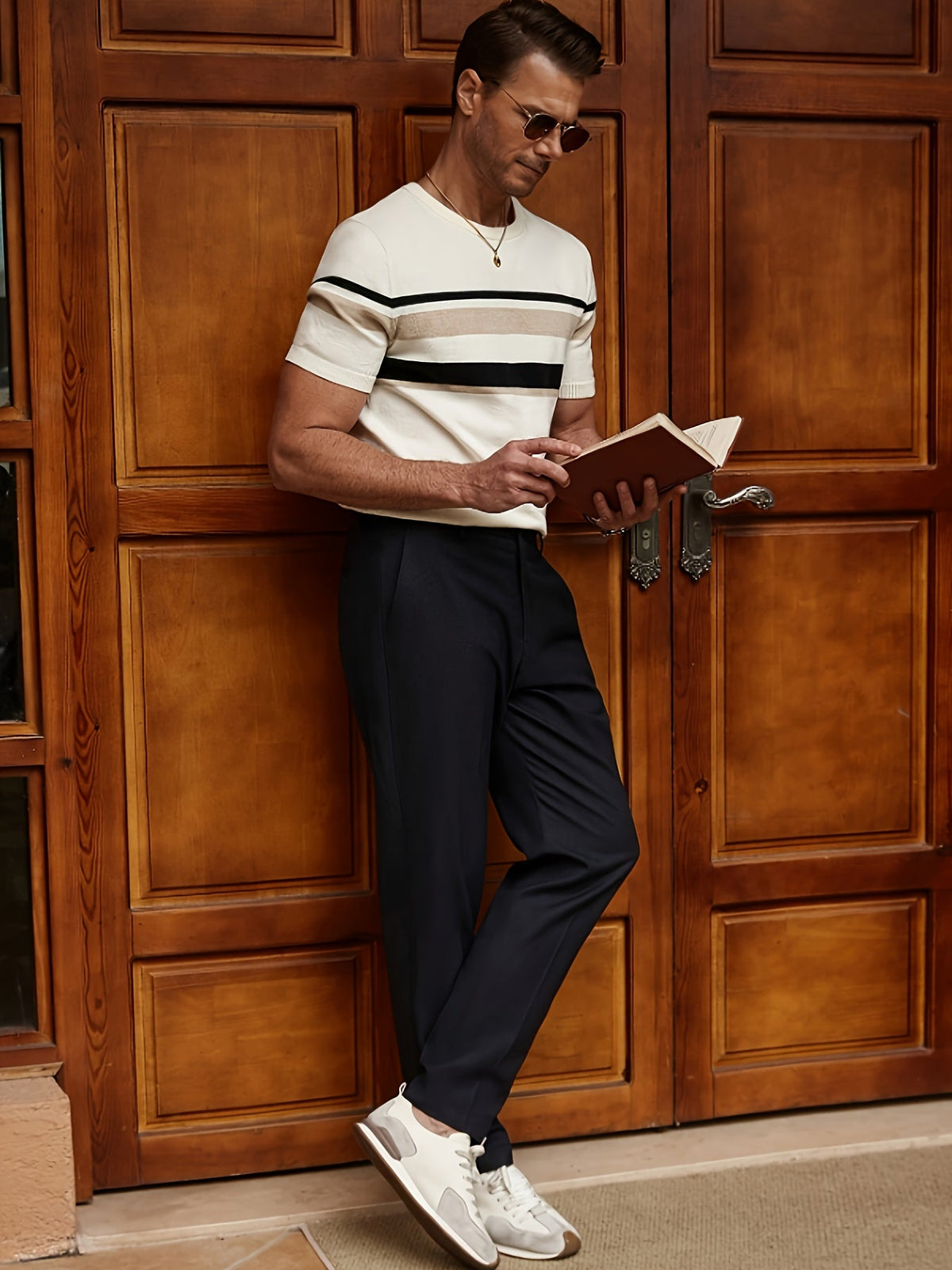 Men's cream knit T-shirt with black and beige horizontal stripes