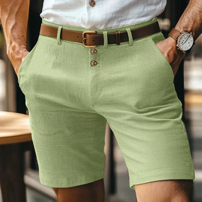 Men's mid-length chino shorts with button front and belt loops