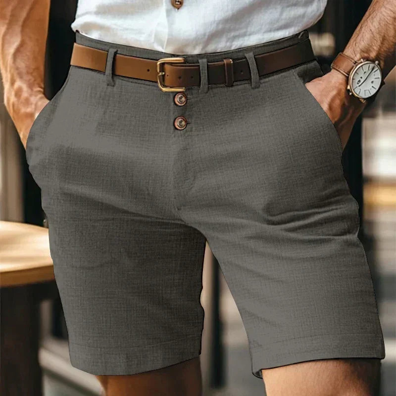 Men's mid-length chino shorts with button front and belt loops